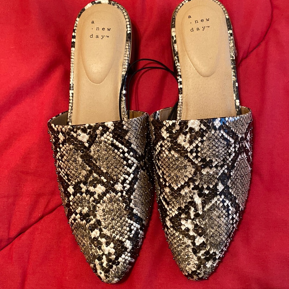 Snake print flats size 10